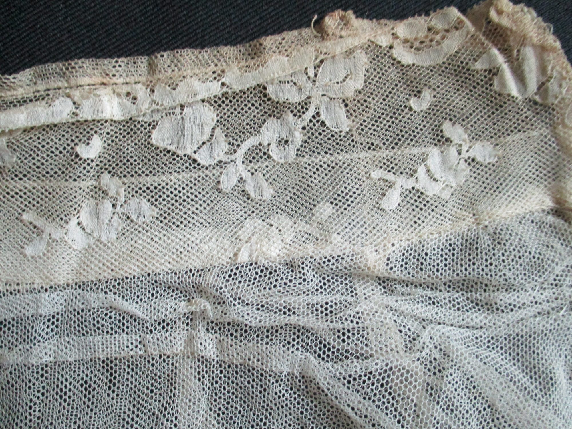 Bib and Collar: Close up of embroidery detail around collar.