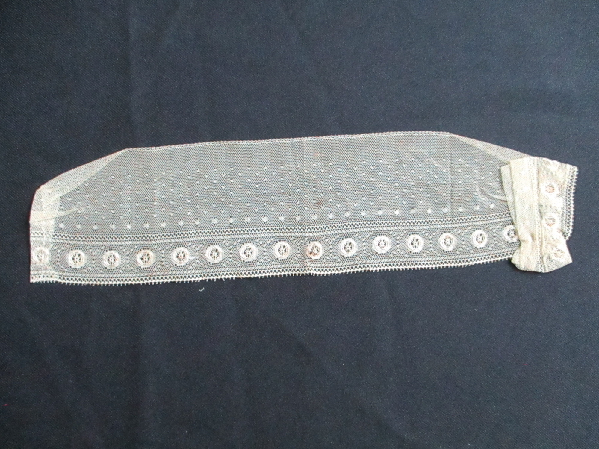 Child's cream collar.