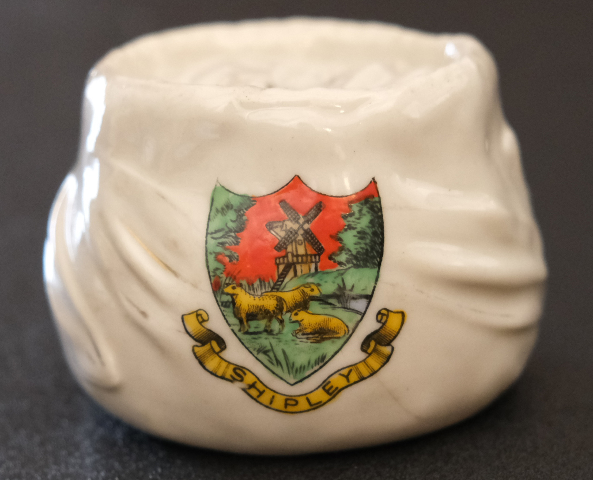 Ink pot: Rear view - Shipley coat of arms