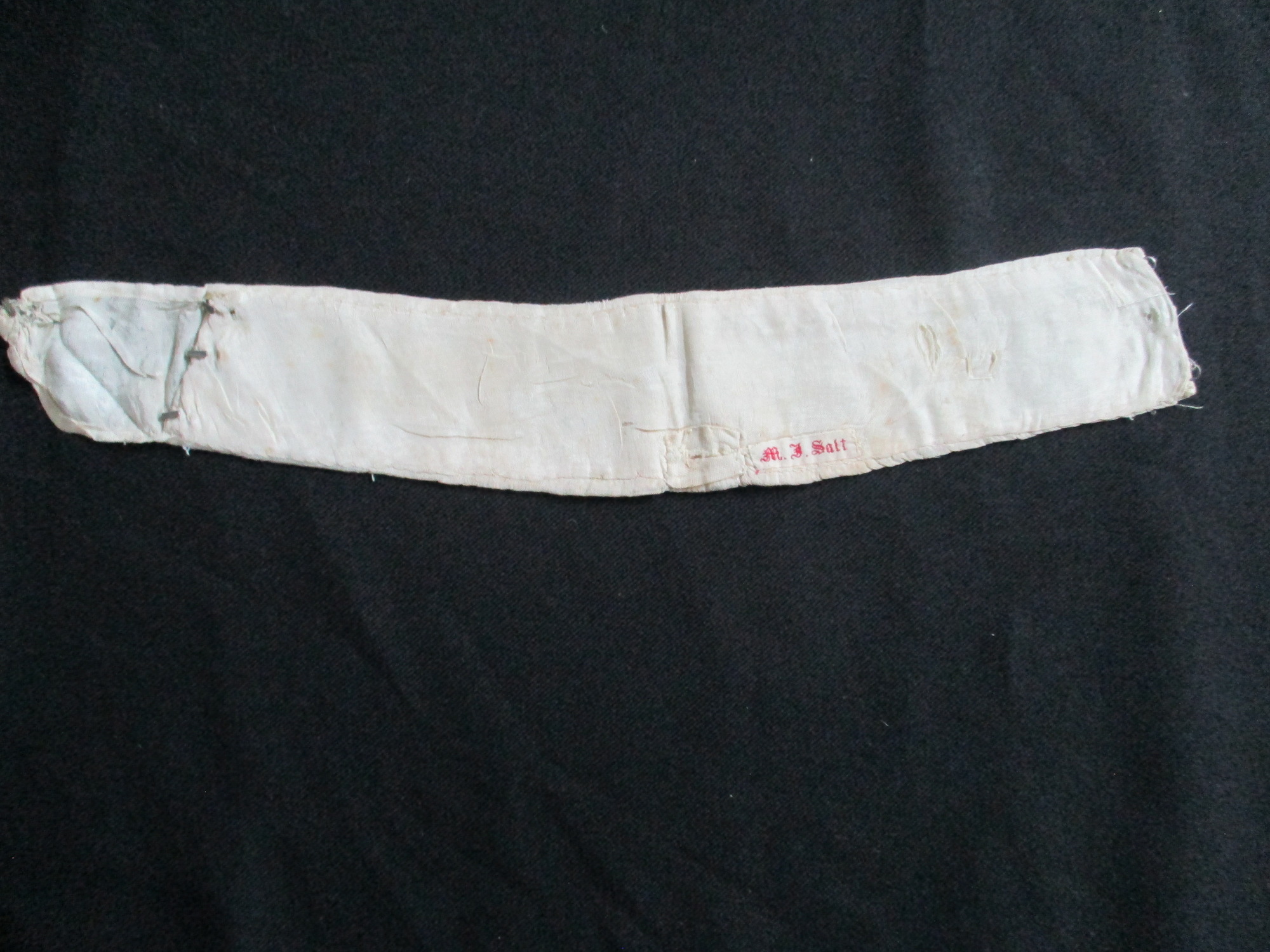 Lace Collar: Reverse image of silk interface with owners name attached.