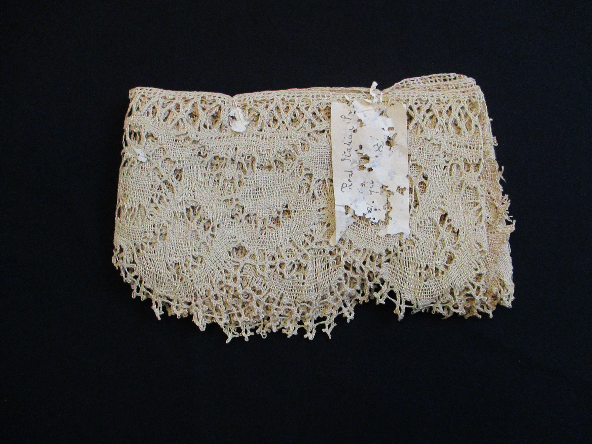 Length of Italian lace with sales ticket.
