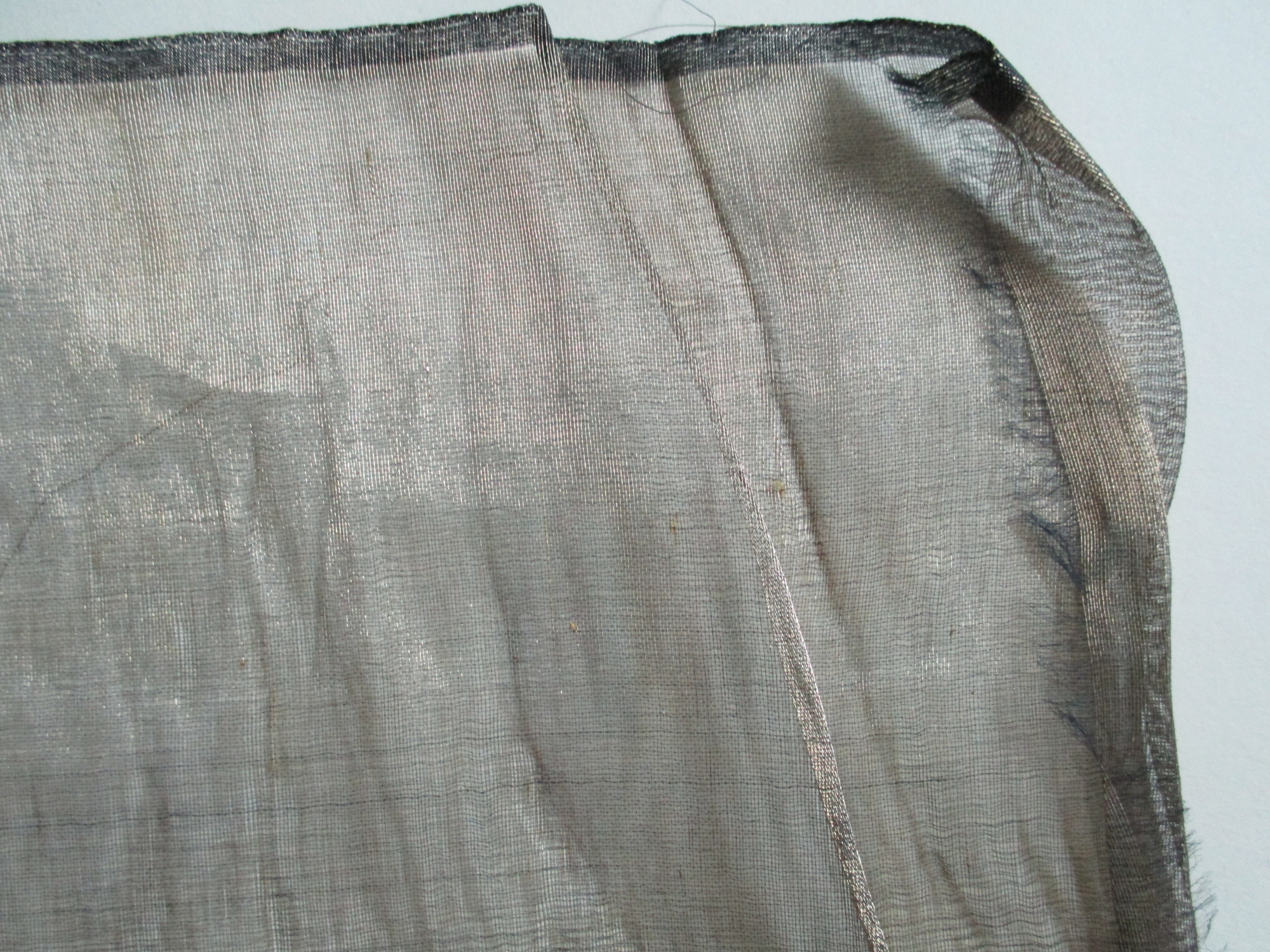 Piece of gold satin material: Corner detail of gold material (ii)