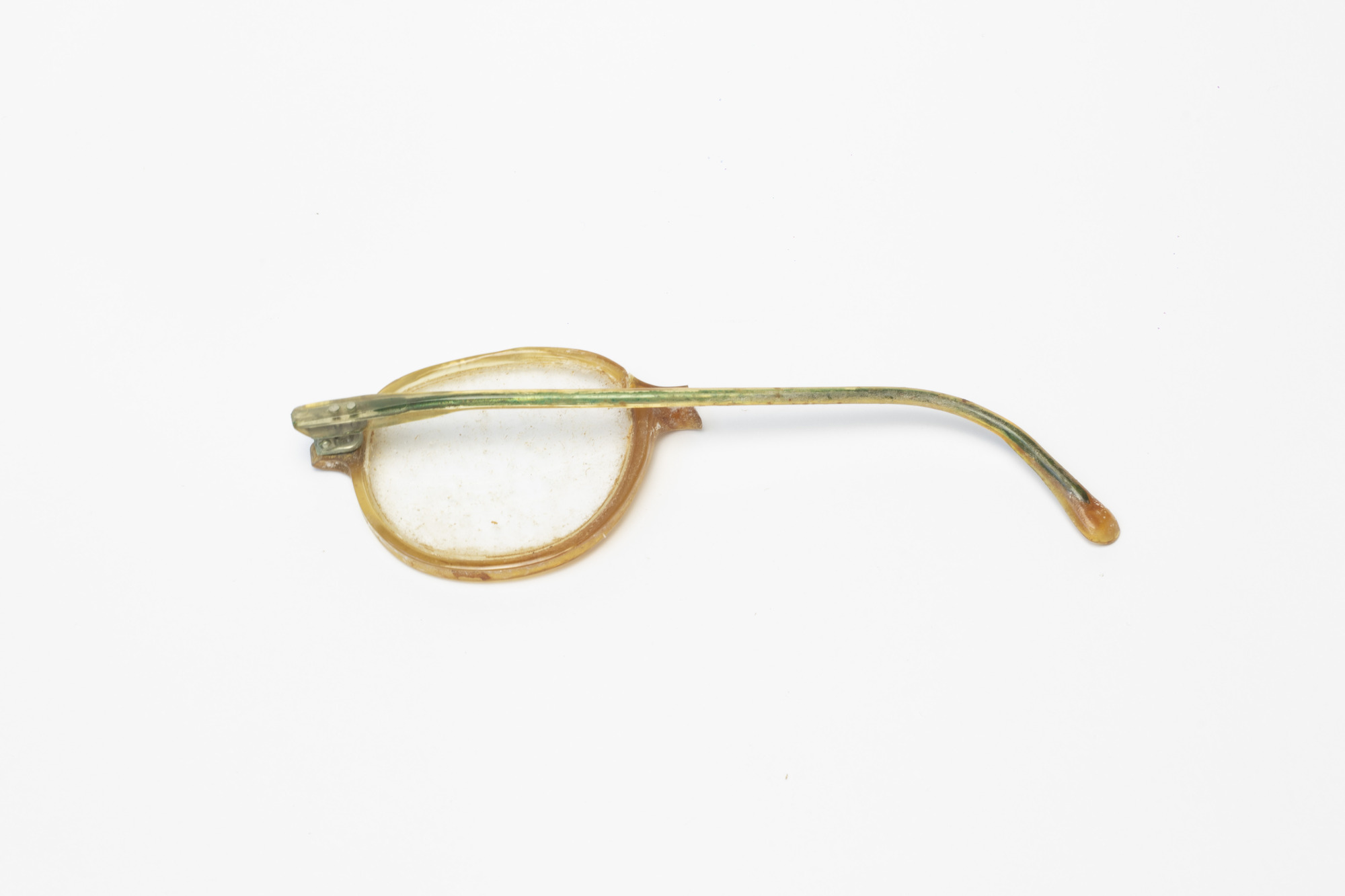 Spectacles: Left hand lens, rear view