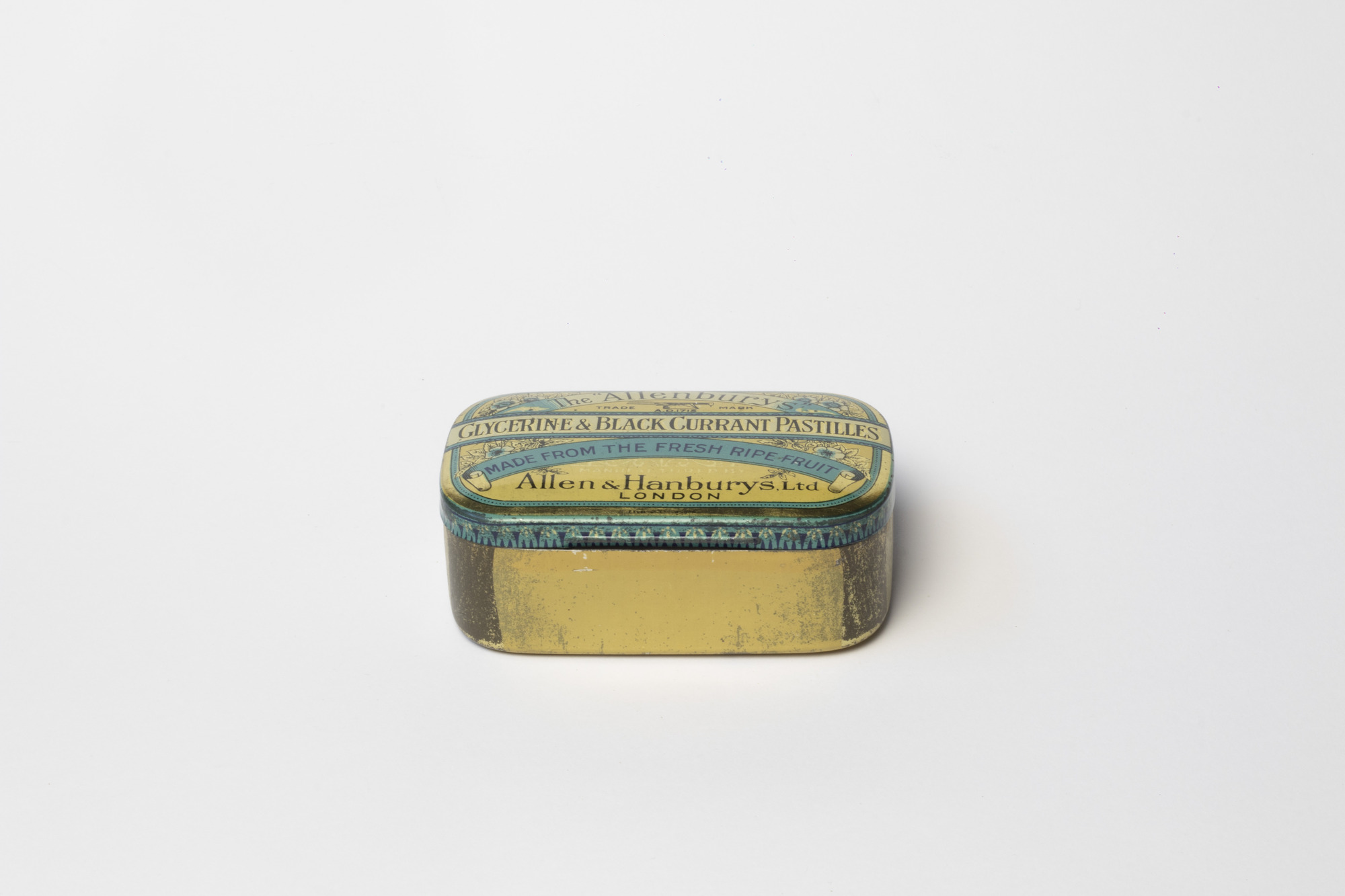 Tin box containing acorns