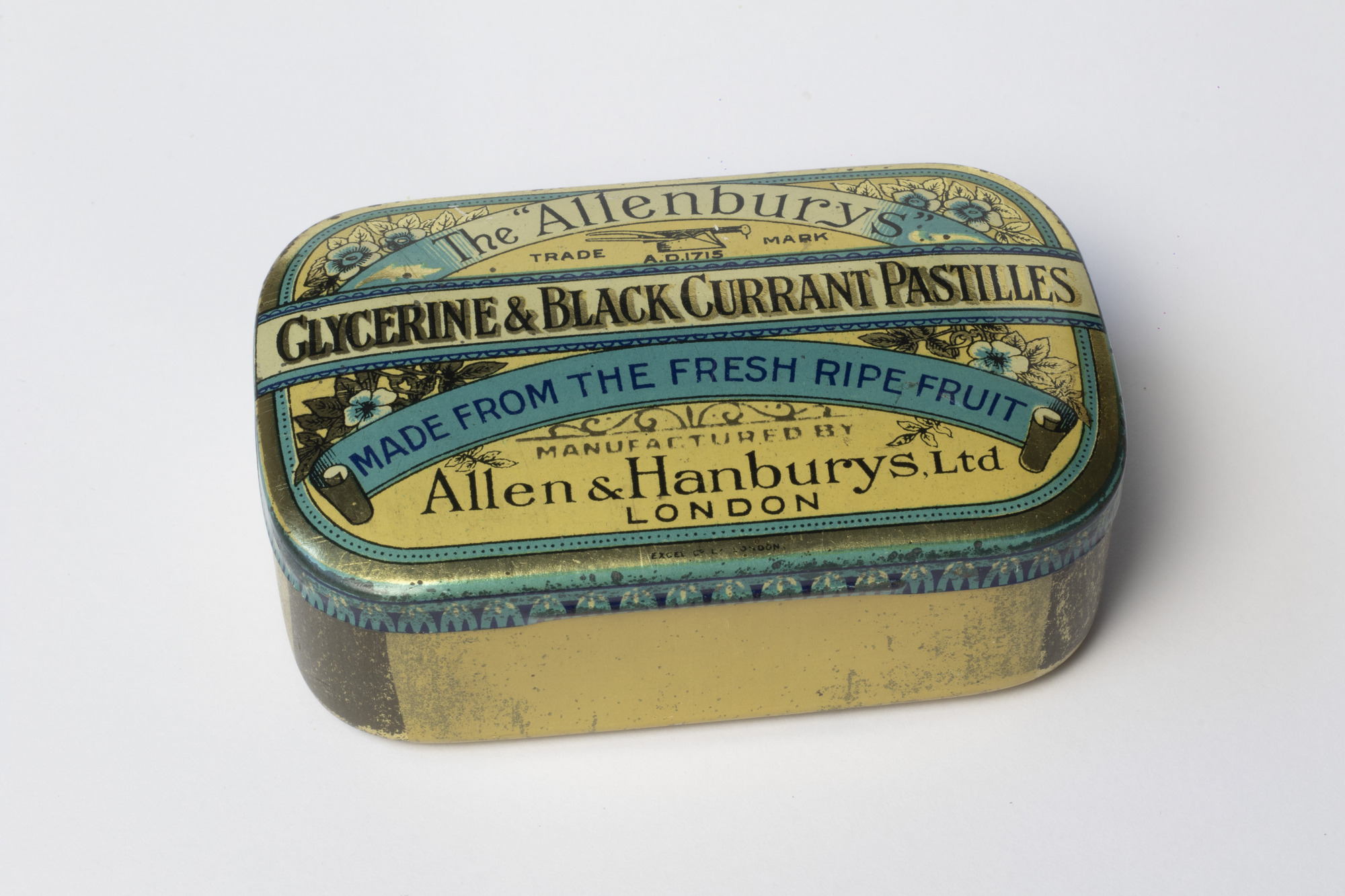 Tin box containing acorns: top view