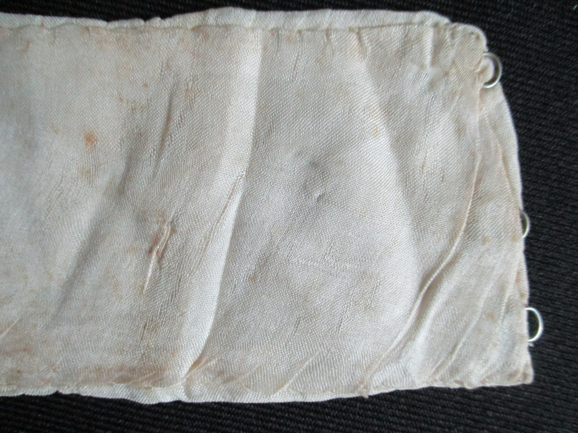 Two part collar: Hook and eye detail on collar liner (ii)