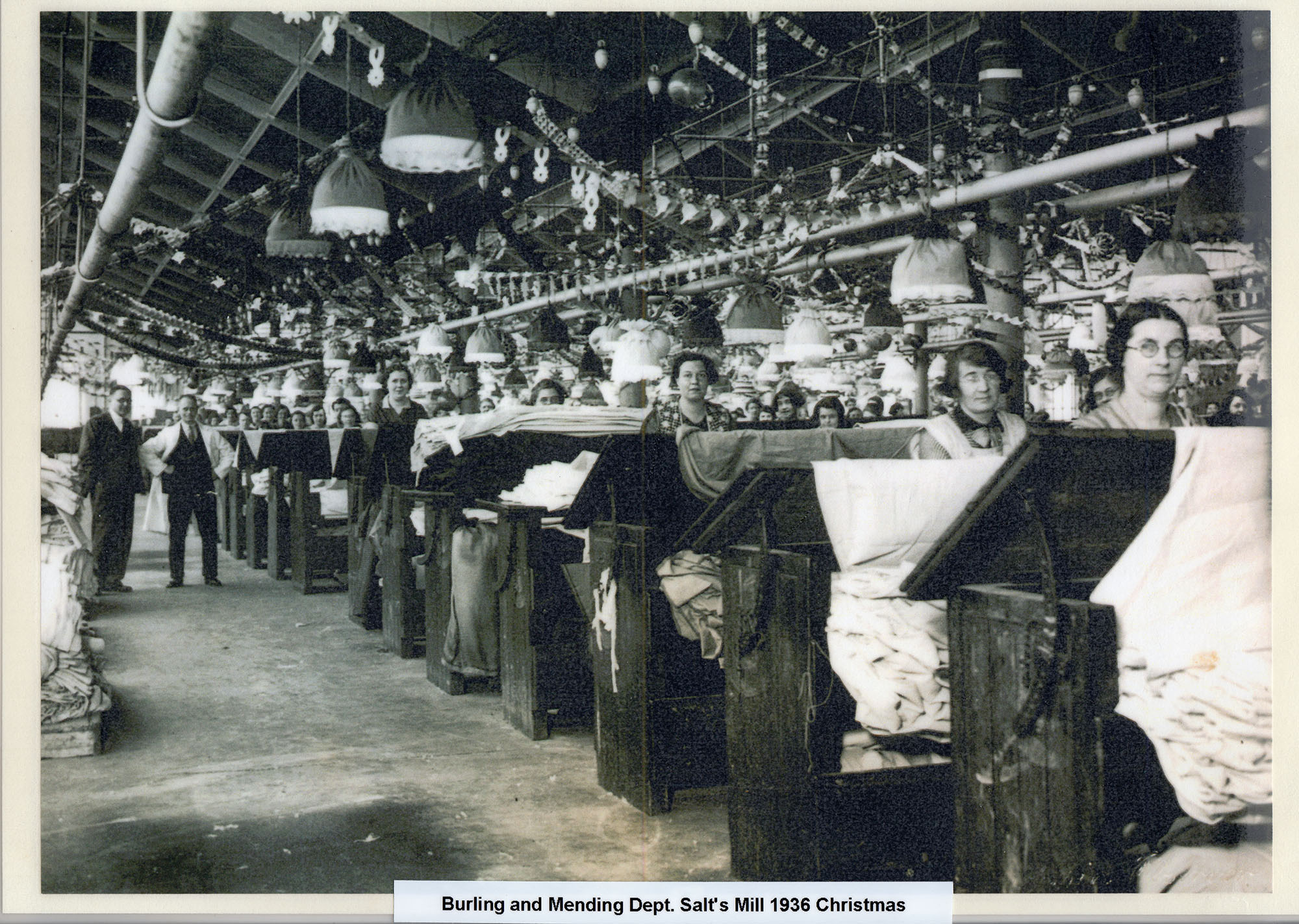 Burling and Mending Department at Salts Mill 1936.