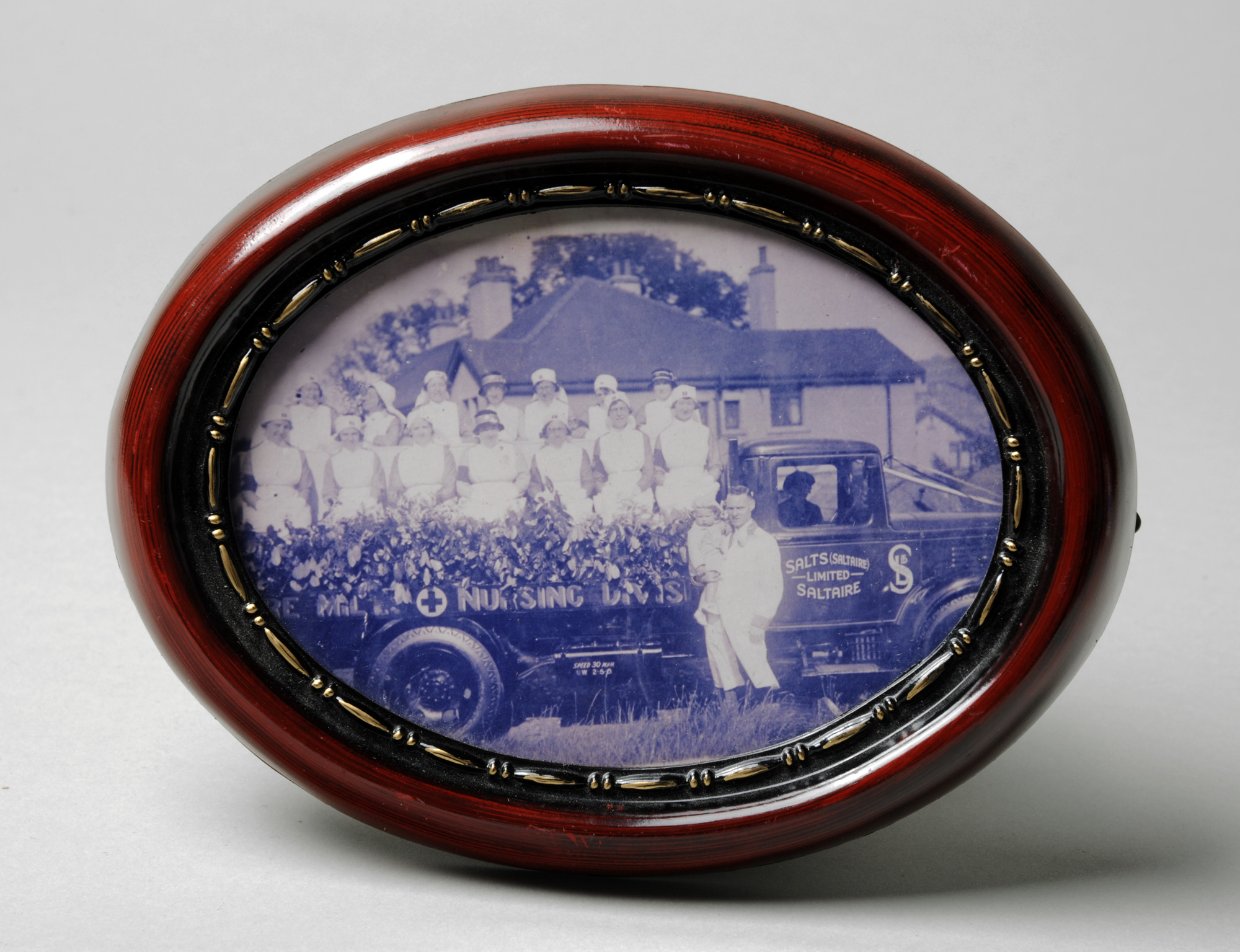 Photograph of nurses on a Salts (Saltaire) Ltd. lorry