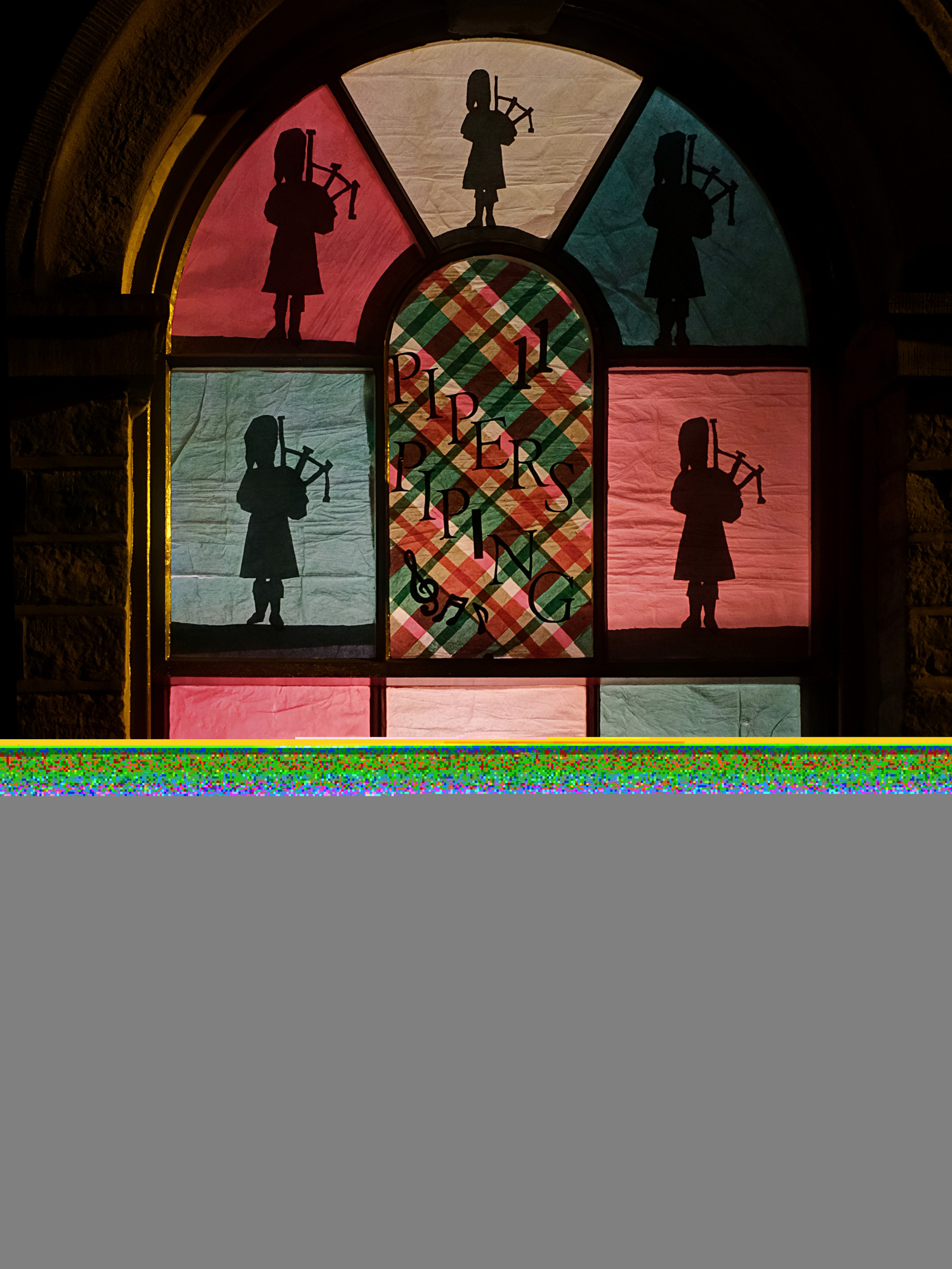 Saltaire Advent Window (Bagpipers)