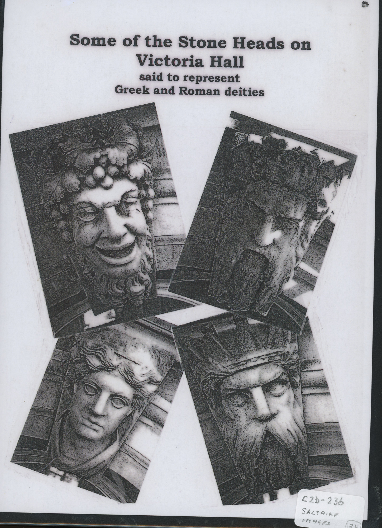 Some of the Stone Heads on Victoria Hall