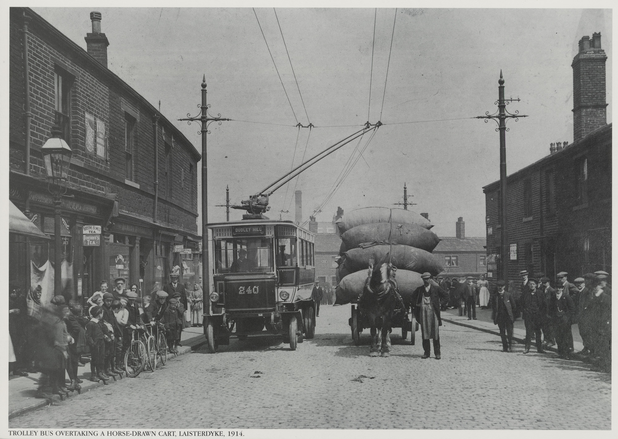 Trolley bus overtaking a horse-drawn cart, Laisterdyke, 1914